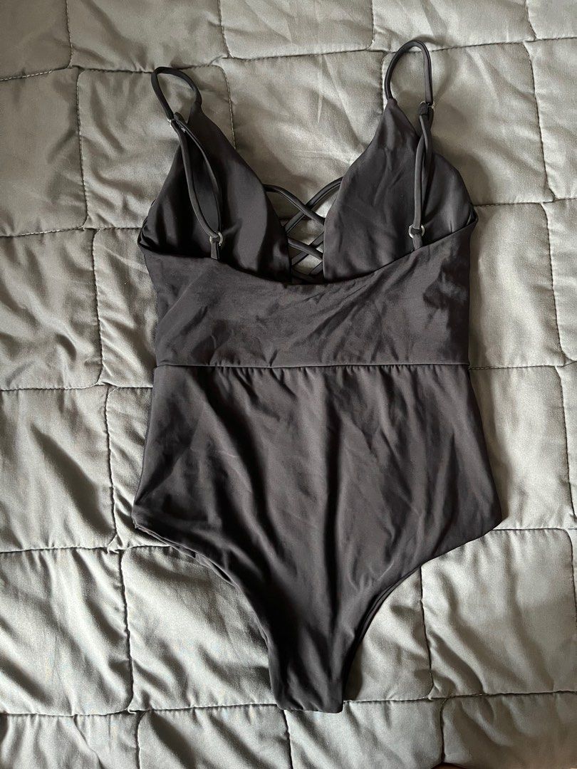 One piece swimsuit (Category: Bikinis & Swimsuits) located in Pasig City. Submitted by beldc (Listing ID 1205241964, Image 3). Description: One piece swimsuit in color black. No brand or tag. Neoprene cloth like. With built in paddings. Best fit for extra small. Actual photos posted.