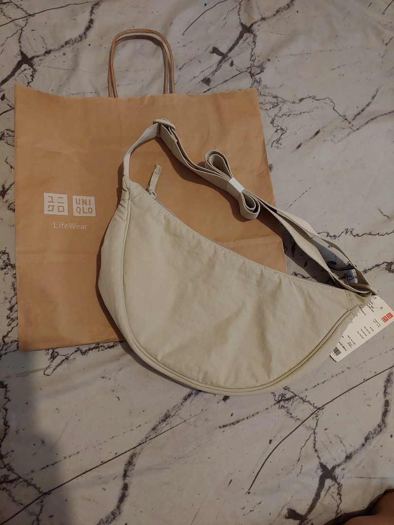 Uniqlo Dumpling bag, Women's Fashion, Bags & Wallets, Cross-body Bags ...