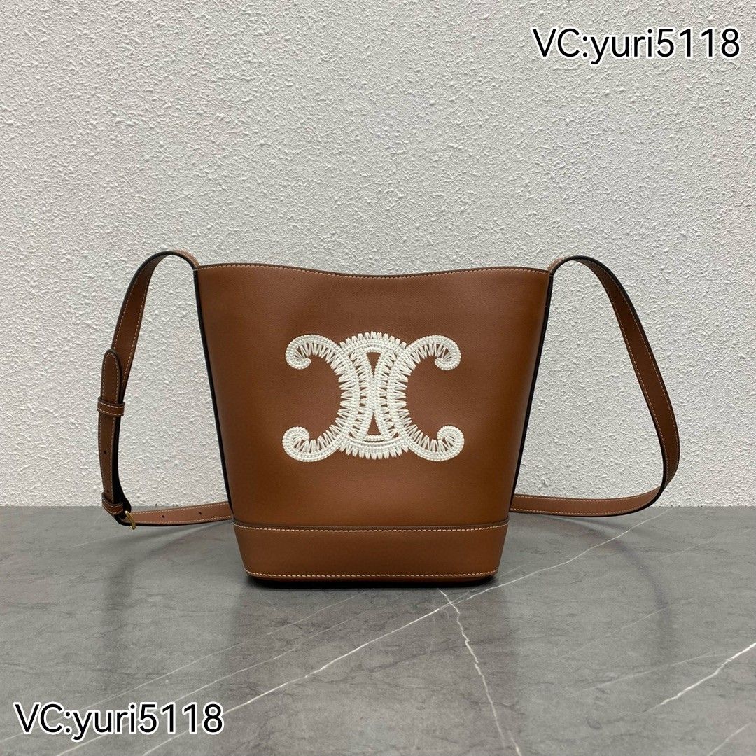 SMALL BUCKET IN TRIOMPHE CANVAS AND CALFSKIN, Women's Fashion, Bags &  Wallets, Cross-body Bags on Carousell