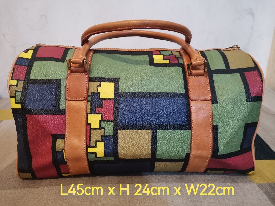 DOUBLE FISH TRAVEL BAG (Category: Luxury Bags & Wallets) located in Quezon City. Submitted by amreensonlinebotique (Listing ID 1205616598, Image 2). Description: ✅💯ORIGINAL DOUBLE FISH ✅WITH ORIGINAL STRAP ✅NO FLAW, SIGNS OF USE ONLY ✅ELEGANT TRAVEL BAG.