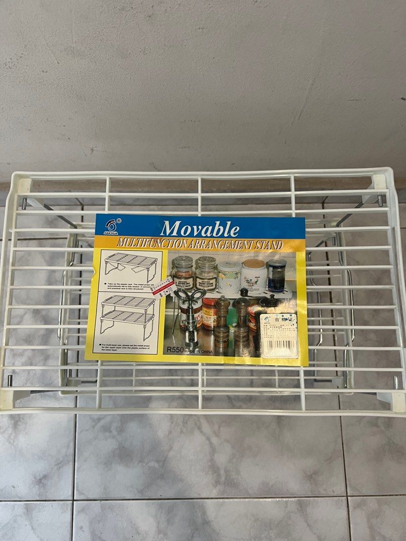 Multifunctional stand (Category: Home Improvement Tools & Accessories) located in Singapore. Submitted by _sweetpinkk (Listing ID 1205533270, Image 1). Description: Multi functional arrangement stand , selling both at $3 L: 38cm , H: 18cm (for one stand).