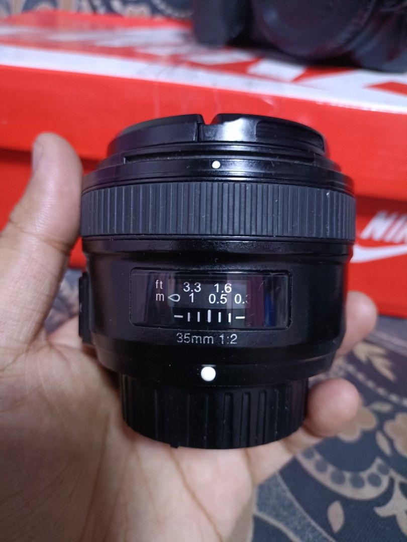 nikon d3100 with 35mm YN F2 (Category: Cameras) located in Caloocan City. Submitted by mr.carlo_dslr_laptop (Listing ID 1205418355, Image 3). Description: Nikon d3100 with YN 35mm F2 Prime Lens Good Condition Ready to Use For 11,000 Cash For 11,000 Cash For 11,000 Cash With Charger With Battery With Strap With Lens Cap With bag With Sd Card Good condition With Autofocus and FLASH Presentable Unit.. No Vignette LCD Cash on Delivery LBC deposit 500