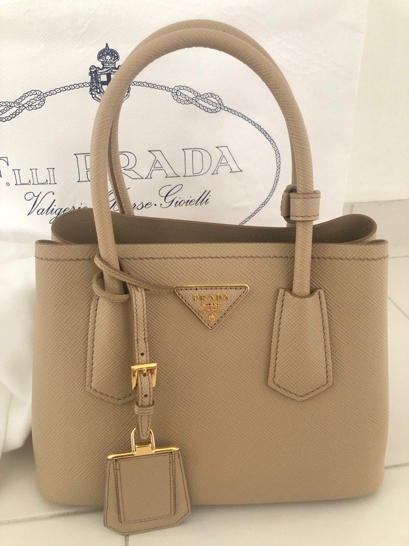 Double The Joy With Prada's Saffiano Leather Mini Pouch - BAGAHOLICBOY