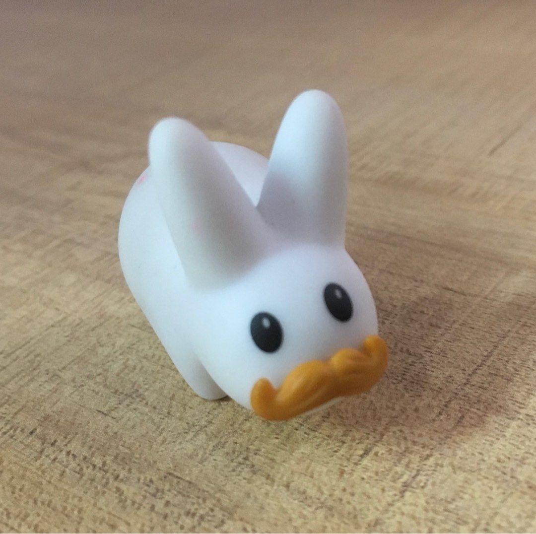 White Stache Happy Labbit (Mini) (Category: Designer & Blind Box Toys) located in Manila. Submitted by dachshund. (Listing ID 1205450784, Image 1). Description: KIDROBOT BY FRANK KOZIK - 1.5 inch vinyl toy - Part of the Happy Labbit Mini Series (2012) Flaw: tiny red stains on side and ear, see 3rd pic RFS: downsizing.