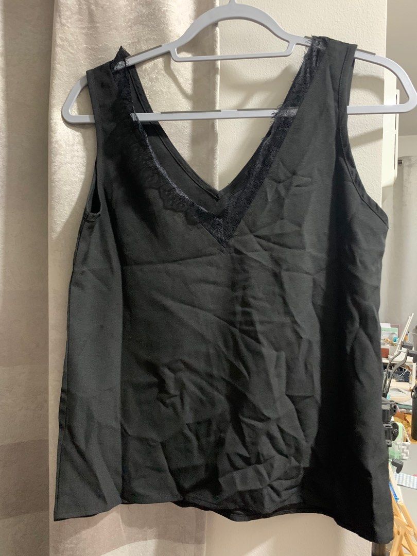 Zalora v-neck lace cami top (Category: Sleeveless) located in San Pedro. Submitted by pandamate (Listing ID 1205548802, Image 1). Description: Classy black v-neck cami top perfect for celebrations/special occasions Still with tag RFS: Doesn’t fit.