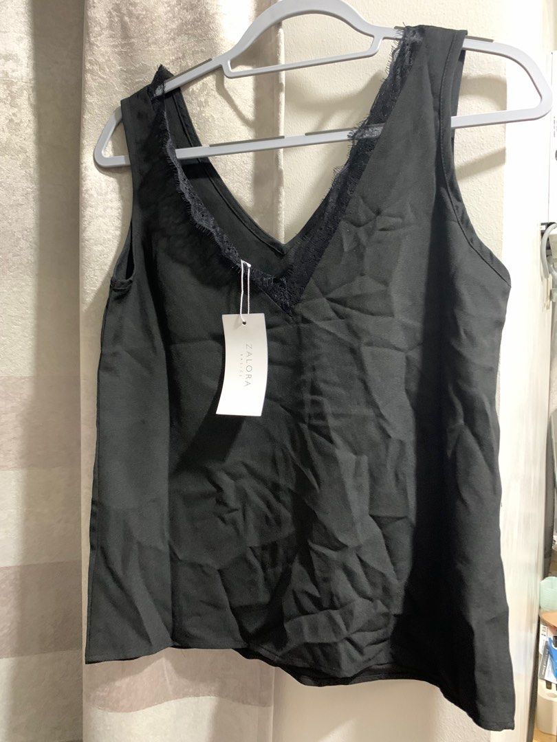 Zalora v-neck lace cami top (Category: Sleeveless) located in San Pedro. Submitted by pandamate (Listing ID 1205548802, Image 3). Description: Classy black v-neck cami top perfect for celebrations/special occasions Still with tag RFS: Doesn’t fit.