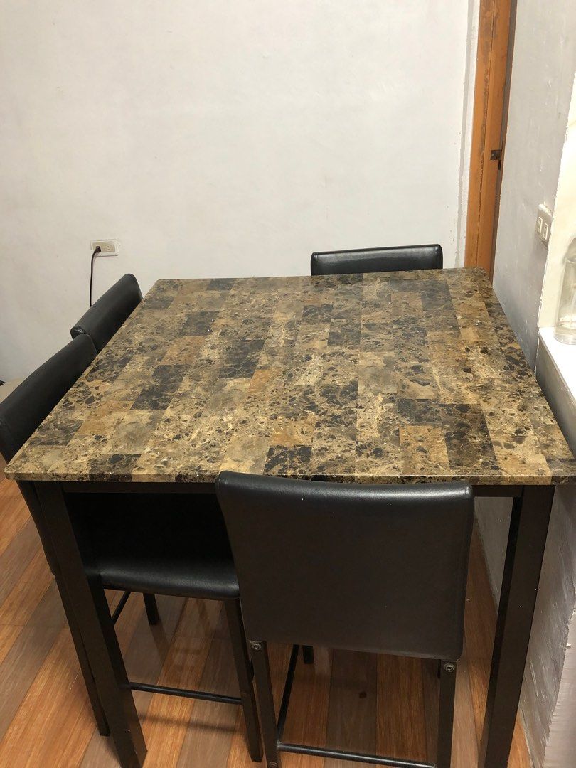 4 seater dining table (high chair) (Category: Tables & Sets) located in Taguig. Submitted by prelovedbypmn (Listing ID 1205798200, Image 1). Description: Rfs: I want a new dining set DIMENSIONS: L96xW96xH91cm.