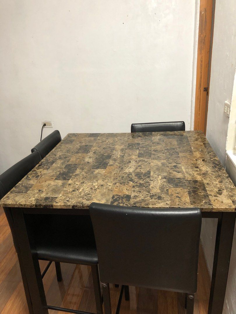 4 seater dining table (high chair) (Category: Tables & Sets) located in Taguig. Submitted by prelovedbypmn (Listing ID 1205798200, Image 2). Description: Rfs: I want a new dining set DIMENSIONS: L96xW96xH91cm.