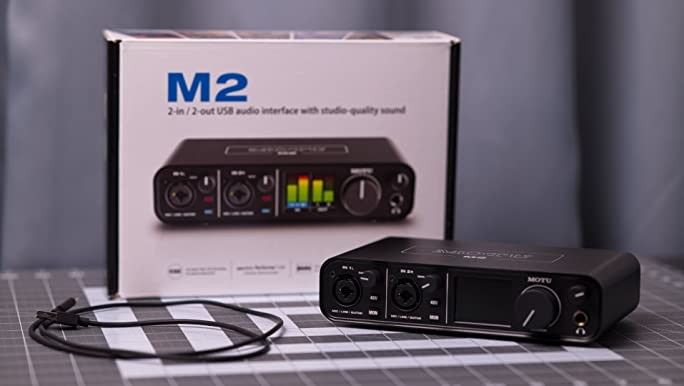 MOTU M2 2x2 USB-C Audio Interface and Headphones