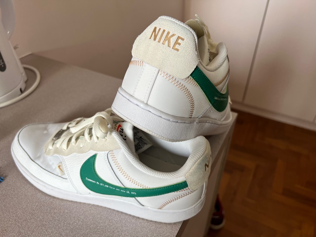 White nike shoes with green swoosh online