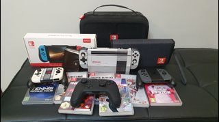 Nintendo Switch Complete Set - Pro Controller, 6 Joy Cons, Games, and More