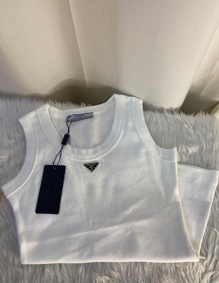 Prada triangle logo luxury tank top preorder (Category: Luxury Apparel) located in Mandaluyong City. Submitted by japanandsingaporeluxepreloved (Listing ID 1205728490, Image 3). Description: Diclaimer: we are not affiliated with the brand stated in this post, no infringement intended. All copyrights are reserved to its brandowners ..