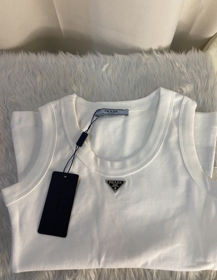 Prada triangle logo luxury tank top preorder (Category: Luxury Apparel) located in Mandaluyong City. Submitted by japanandsingaporeluxepreloved (Listing ID 1205728490, Image 2). Description: Diclaimer: we are not affiliated with the brand stated in this post, no infringement intended. All copyrights are reserved to its brandowners ..
