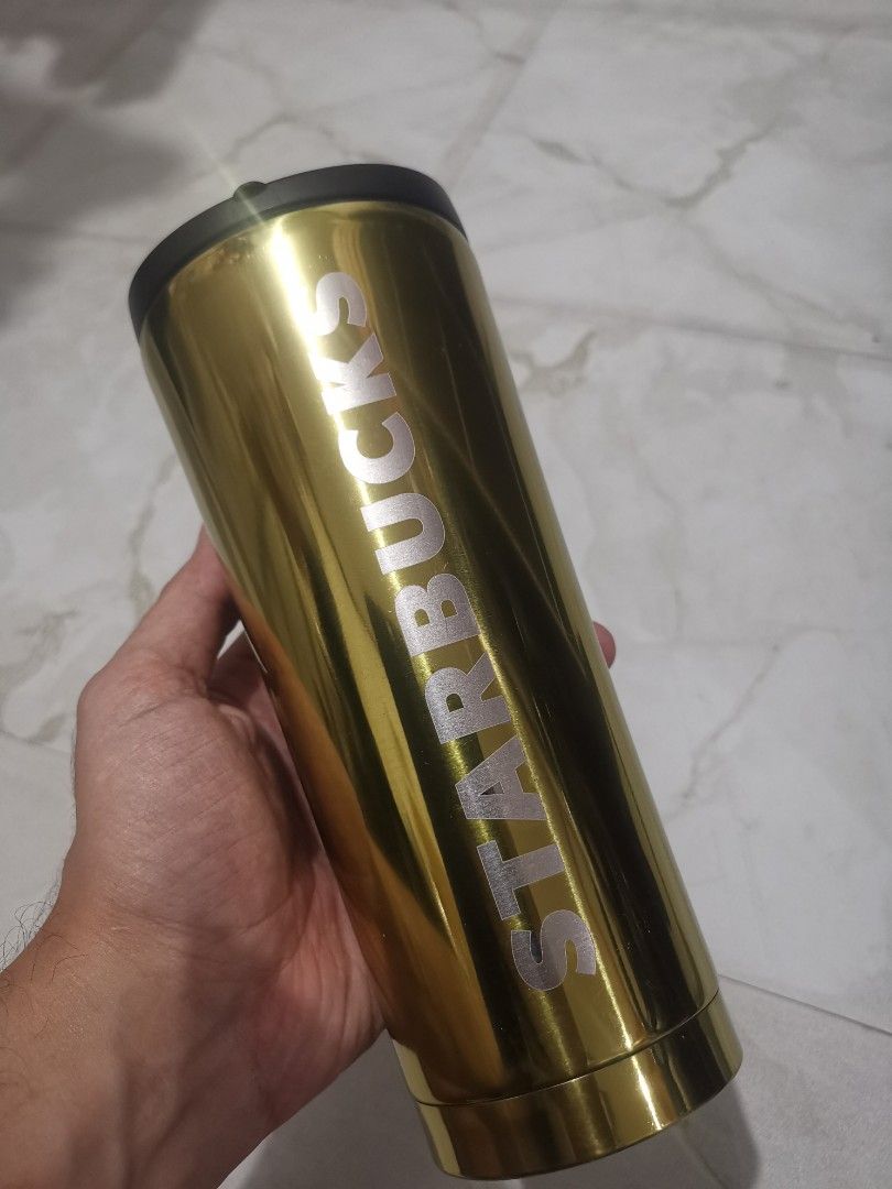 Starbucks authentic original 473ml gold (Category: Water Bottles & Tumblers) located in Taguig. Submitted by jessdoit29 (Listing ID 1205771169, Image 2). Description: Selling my lightly used tumbler from starbucks This is a 473ml tumbler colour gold chrome Negotiable.