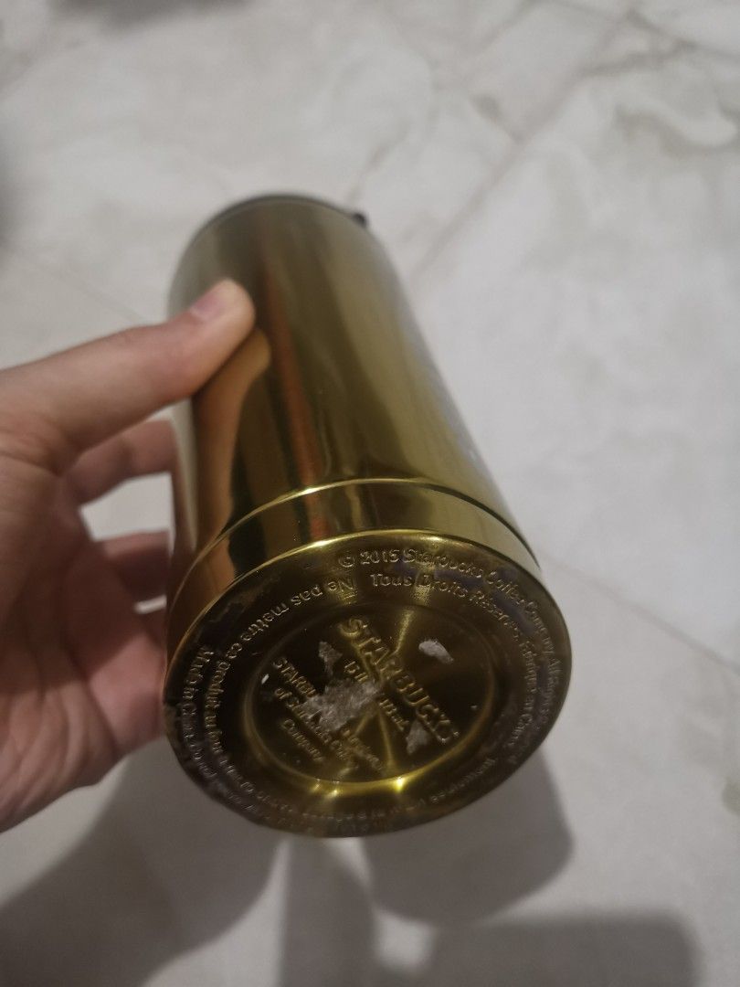 Starbucks authentic original 473ml gold (Category: Water Bottles & Tumblers) located in Taguig. Submitted by jessdoit29 (Listing ID 1205771169, Image 3). Description: Selling my lightly used tumbler from starbucks This is a 473ml tumbler colour gold chrome Negotiable.