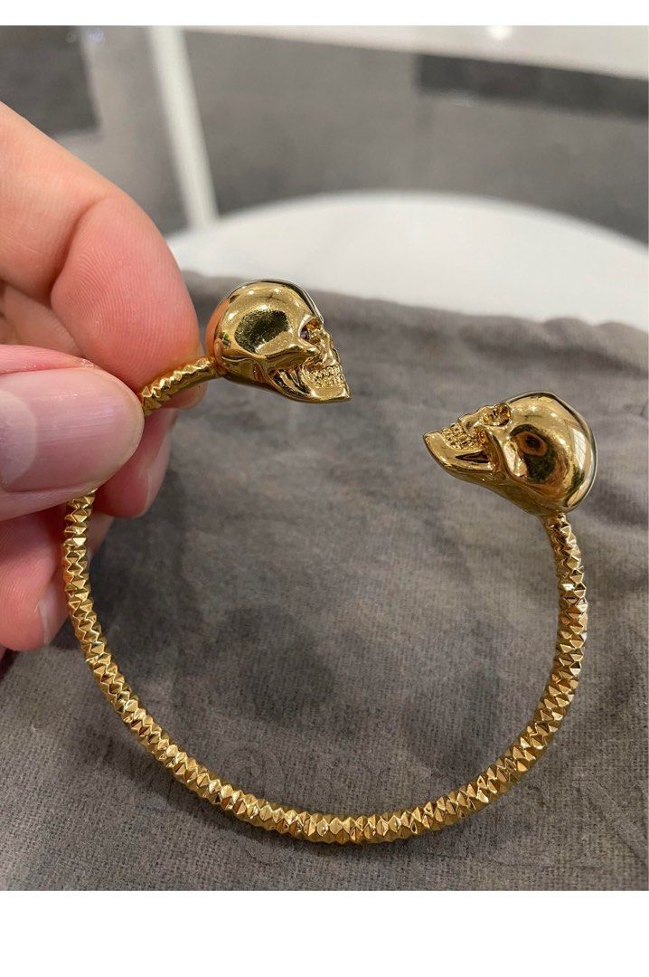 Alexander mcqueen gold skull sales bracelet