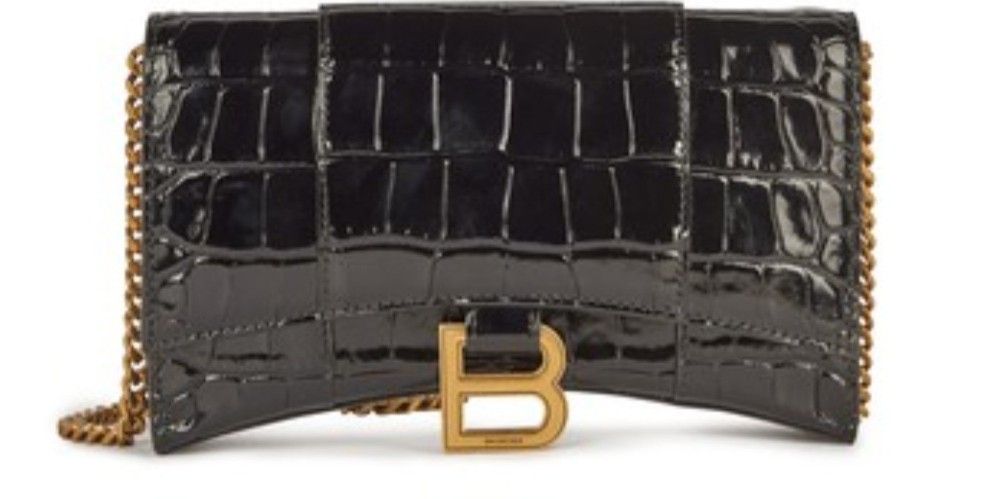 Brand New Balenciaga Hour Glass Wallet w Chain (Category: Bags & Wallets) located in Singapore. Submitted by ho8jo (Listing ID 1205906047, Image 1). Description: Never used came in original packaging. Bought in Europe. Removable chain to become a clutch bag. L7.6 x H4.7 x W1.9 inch Genuine buyer pls 🙏.