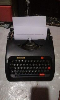 F/S: Black Olympia Typewriter (Vintage )