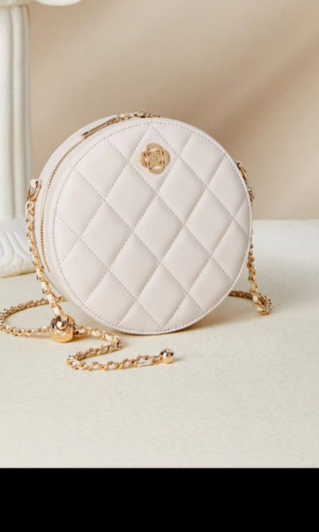Lovely white round cross body bag