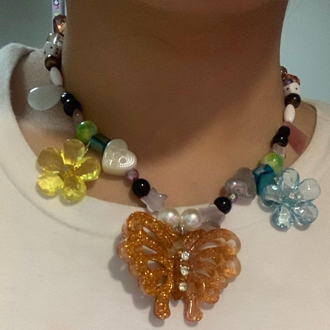 Phoebe Butterfly Necklace (Category: Necklaces) located in Makati City. Submitted by hellogaragekitty (Listing ID 1205941346, Image 2). Description: Phoebe Butterfly Necklace Mine for 190php - 16-18.5 inches - personally designed and handmade by me! - good quality beads are used for the necklace but still fragile so please wear it gracefully ^___^ - inspired by my love for phoebe buffay’s unique collection of charm necklace this is a handmade jew