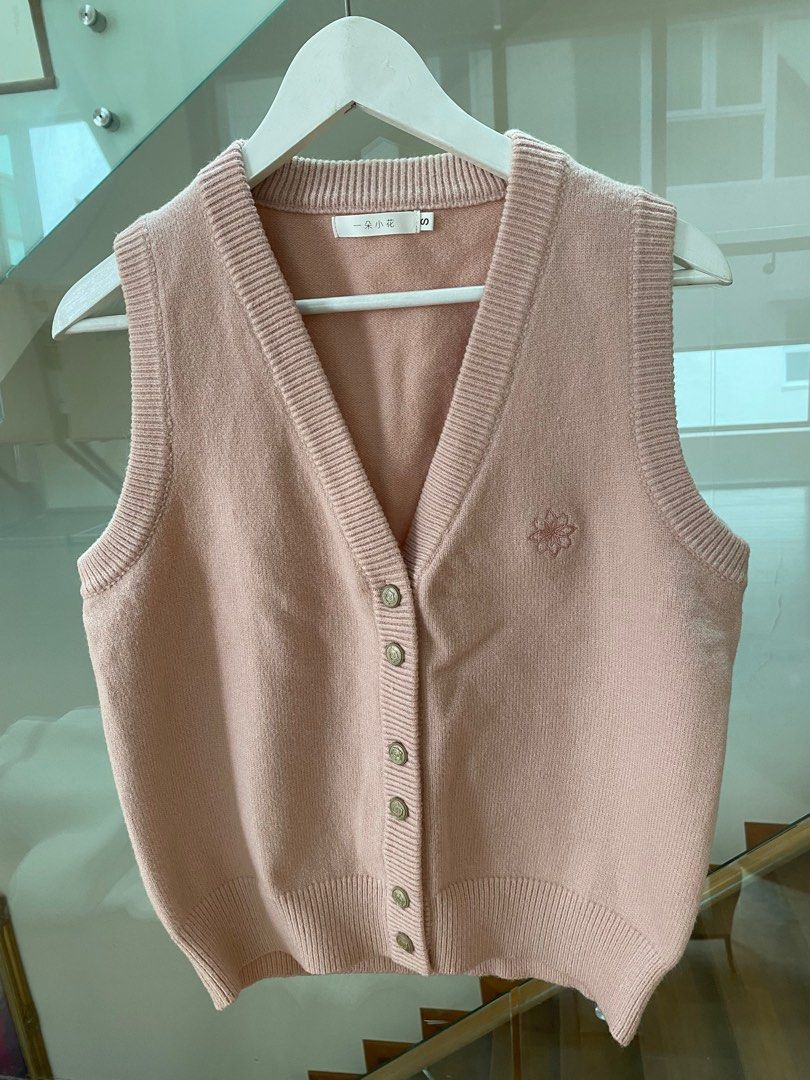 pink sweater vest