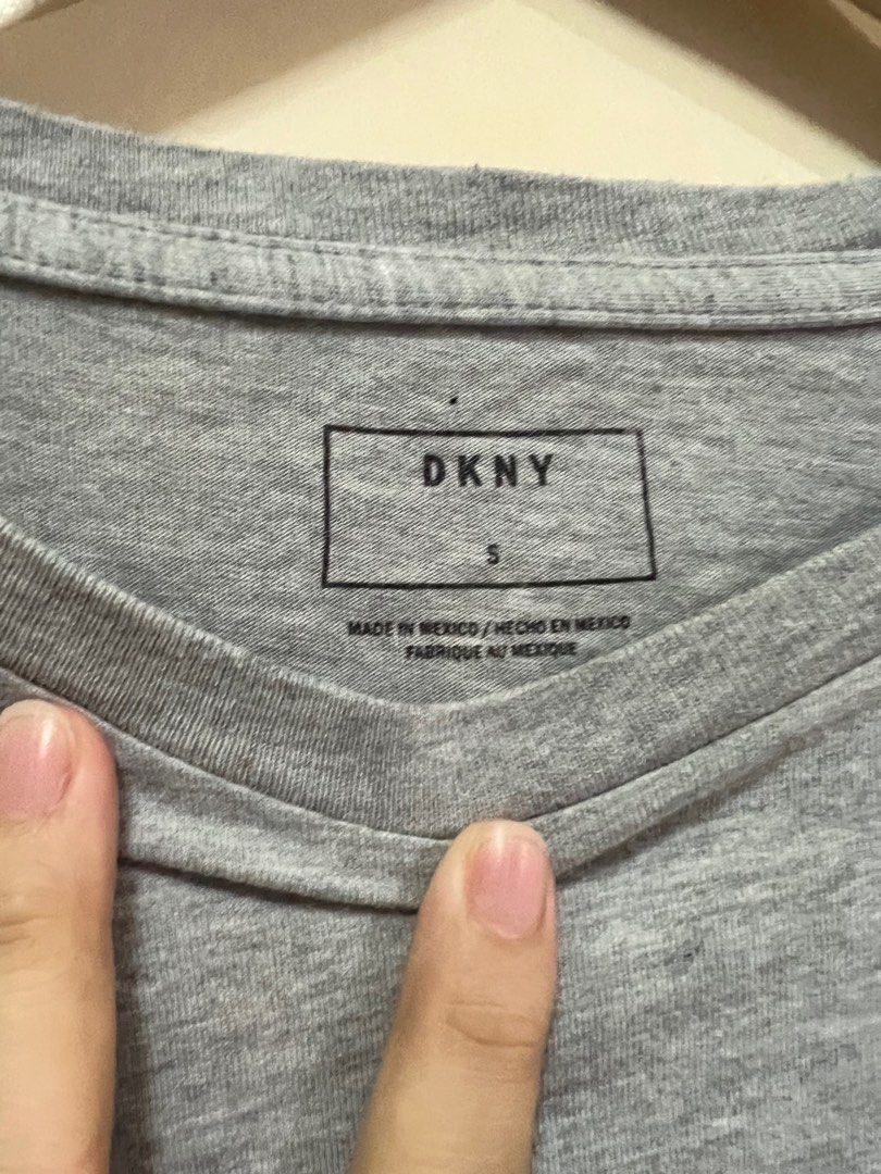 Preloved DKNY Gray Shirt (Category: Tshirts & Polo Shirts ) located in Davao. Submitted by SimpleAndJust (Listing ID 1205987320, Image 2). Description: DISCLAIMER: The item is preloved so please manage your expectations. The color may vary due to lighting and/or your screens setting. .
