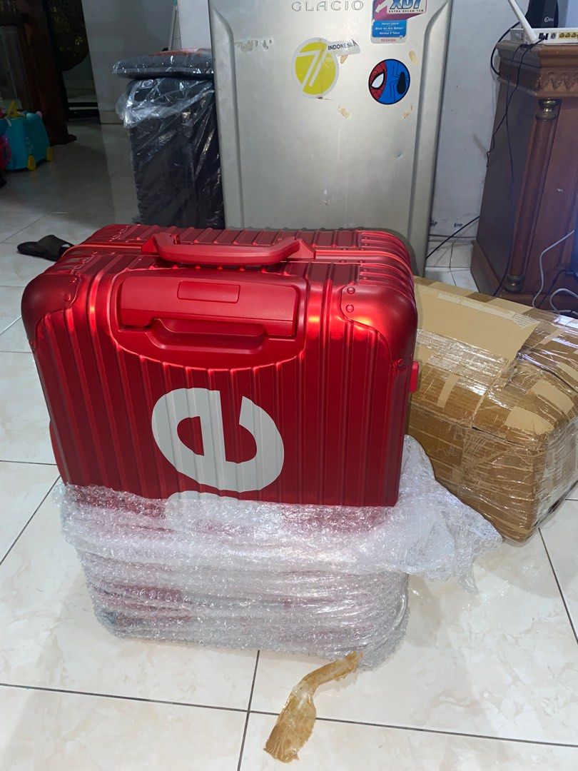 Rimowa supreme harga hot sale