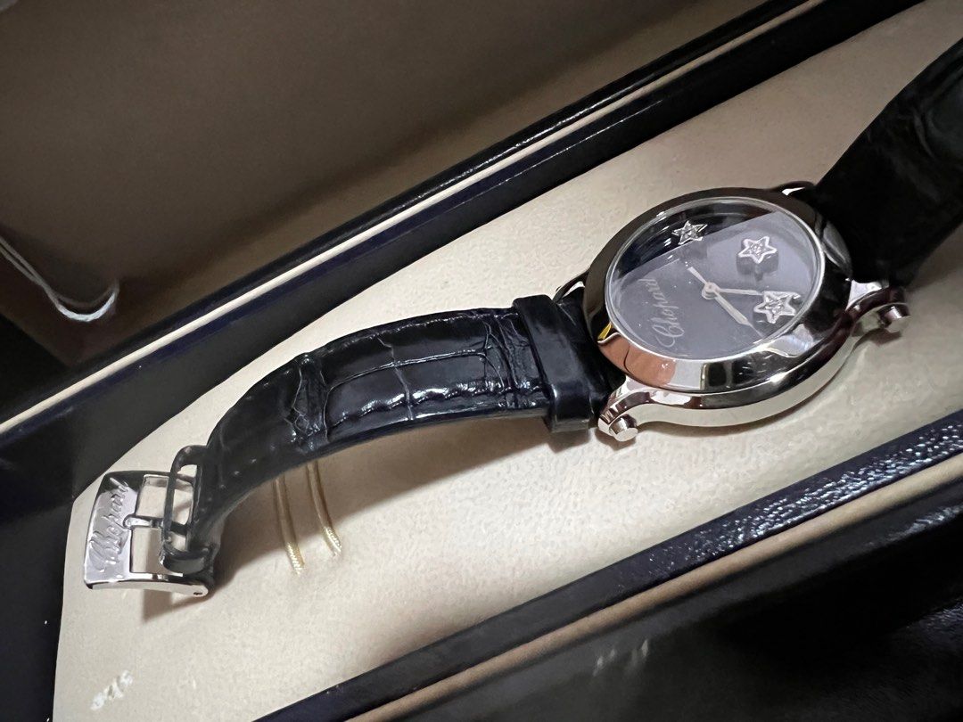 Chopard (Category: Watches) located in Singapore. Submitted by peardrops (Listing ID 1206110891, Image 3). Description: Hardly worn, croc strap. Watch in midnight blue with sapphire crown and 3 moving atar diamonds. Bezel polished and battery changed. Serviced by Chopard. Full set with certificate & box..