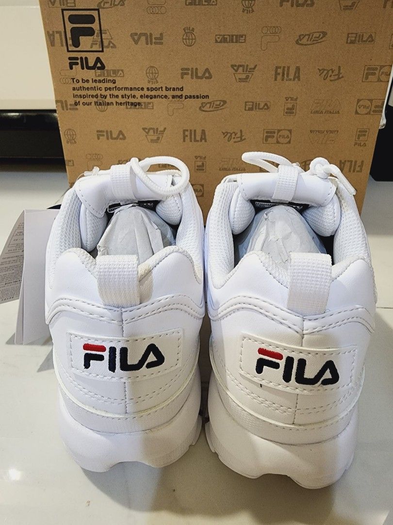 Real vs top fake fila disruptor