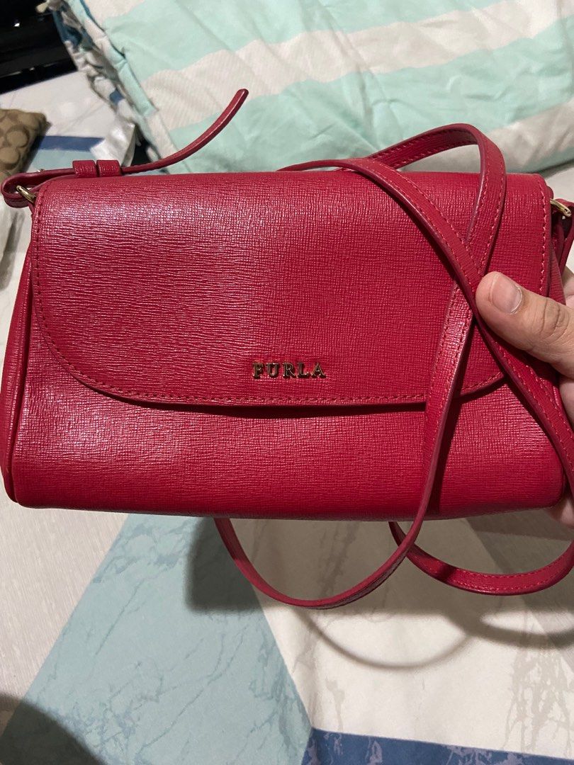 Furla Small Sling Bag (Category: Cross-body Bags) located in Cainta. Submitted by lexichoco (Listing ID 1206154418, Image 1). Description: .