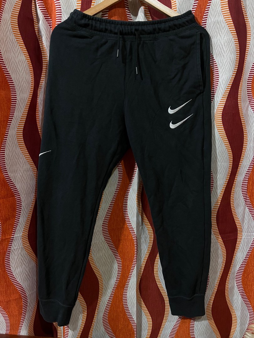 Nike multiple swoosh jogger, Men's Fashion, Bottoms, Joggers on Carousell