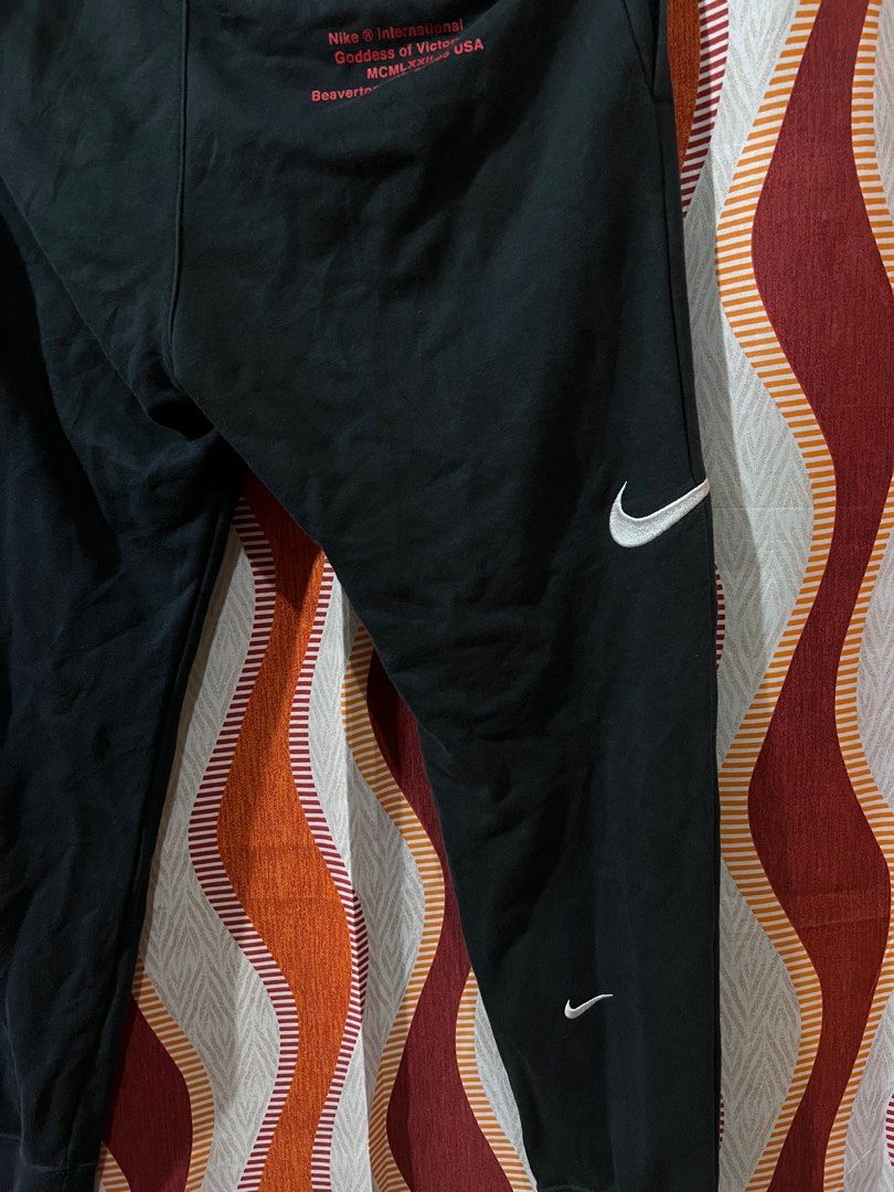 Nike multiple swoosh jogger, Men's Fashion, Bottoms, Joggers on Carousell