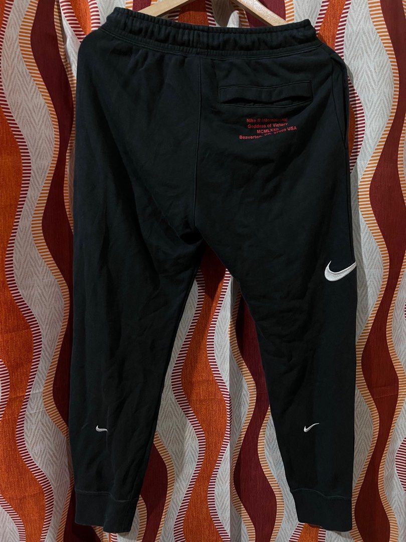 Nike multiple swoosh jogger, Men's Fashion, Bottoms, Joggers on Carousell
