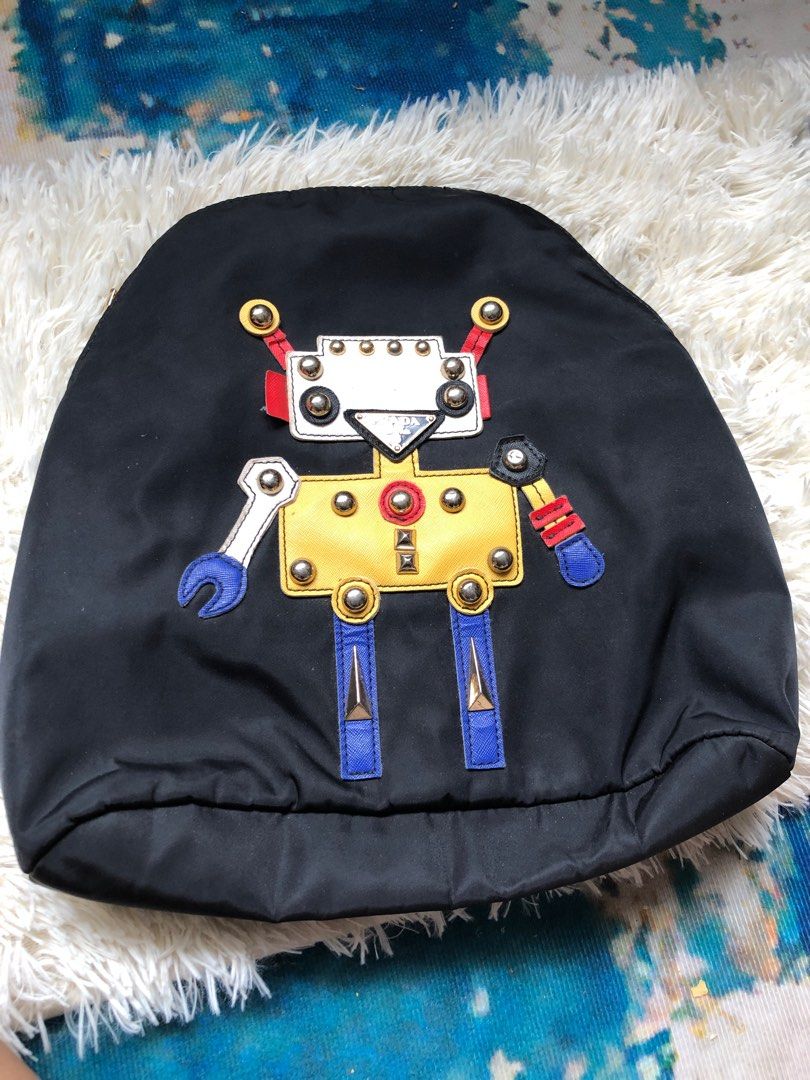Prada Backpack (Category: Backpacks) located in Kuala Lumpur. Submitted by mrsuzza (Listing ID 1206119480, Image 1). Description: Sila tekan read more👇🏼 Ciri-ciri beg ✔️ sesuai utk beg santai2, beg tuisyen, beg tadika. ✔️ Ada kesan pemakaian, Ada pecah sikit dekat telinga, boleh refer gambar. ✔️ beg nampak cantik lagi ✔️ bucu piping lawa lagi, kesan penggunaan tak ketara ❤️luar & dalam bersih 👜Boleh slide gambar dan nilai sendiri. 👜Bucu pipin