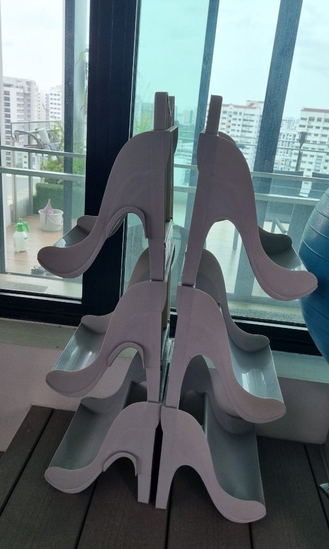 Shoe rack (Stackable) (Category: Outdoor Furniture) located in Singapore. Submitted by duskingang (Listing ID 1206104152, Image 2). Description: A pair of stackable shoe racks for both outdoor and indoor use. Holds up to 6 pairs of shoes. Material: Parkesine $12 each Feel free to text me for any queries Measurements: 21.5cm width by 67cm height by 21cm depth.