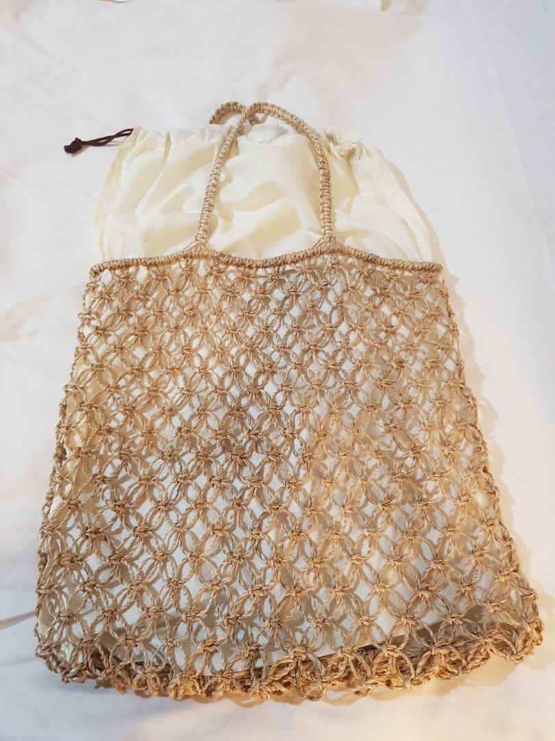 Abaca beach bag with lining (Category: Beach Bags) located in Makati City. Submitted by B_man (Listing ID 1200758019, Image 2). Description: fashionable woven abaca bag. 66cm x 45cm (from top of handle to bottom of bag)..