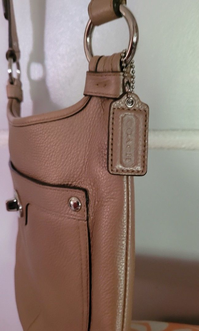 Coach crossbody bag nude beige (Category: Luxury Bags & Wallets) located in Batangas. Submitted by flying_cosmos (Listing ID 1200602101, Image 3). Description: not used, almost brand new as seen on pics from US, authentic no flaws 10.5 x 11.5 inches.