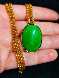 Green stone pendant brooch from Japan