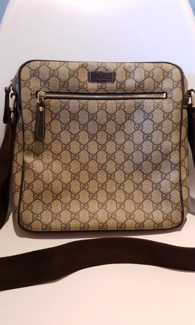 Gucci GG Supreme Messenger Bag (Category: Luxury Bags & Wallets) located in San Juan City. Submitted by risha09 (Listing ID 1200683709, Image 1). Description: Gucci GG Supreme Messenger Bag Sling bag With zipper pocket in front and small compartment inside With slight stains No box and dustbag.