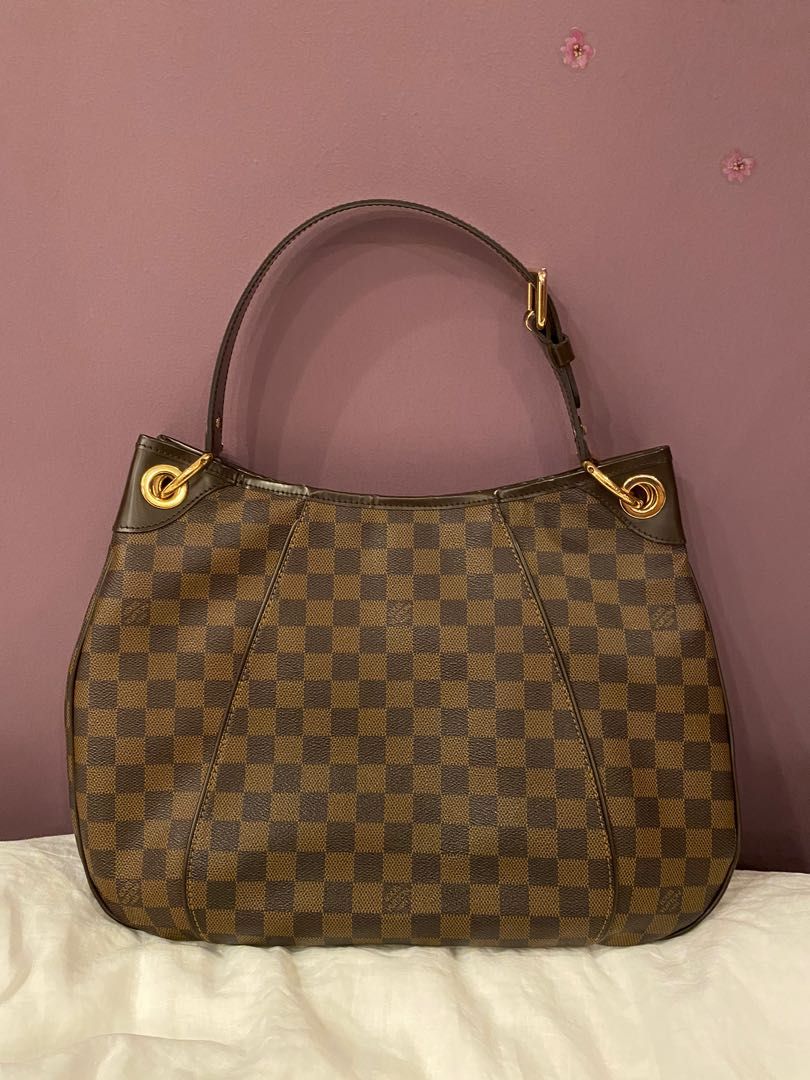 LOUIS VUITTON Damier Ebene Galliera PM (Category: Luxury Bags & Wallets) located in Quezon City. Submitted by michaelacd (Listing ID 1200621545, Image 3). Description: BIG DISCOUNT FOR A LIMITED TIME ONLY from 90k to 70,000 only!! LOUIS VUITTON Damier Ebene Galliera PM - well used with minor flaws. still in great shape and condition - open top with magnetic snap closure - has 3 compartments inside - adjustable strap - interior lining is still cle