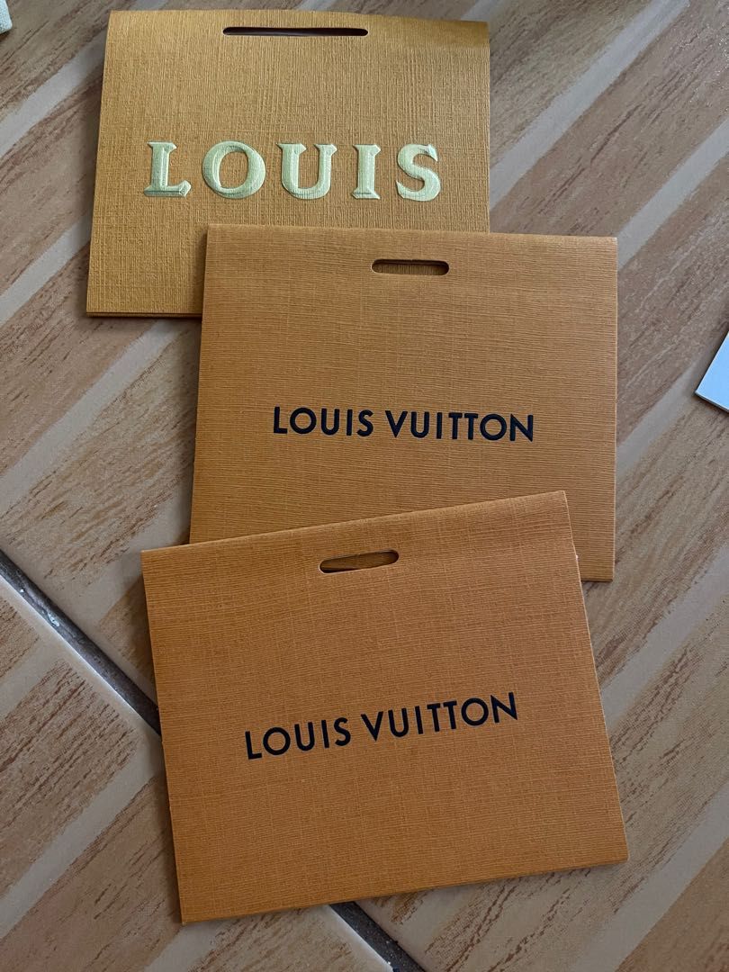 LV cards (Category: Luxury Accessories) located in Antipolo. Submitted by ambercs (Listing ID 1200662339, Image 2). Description: auth lv cards/ tags/ care card/ envelop card per piece- ranges 150- 200pesos ribbon: LV and prada available ( 300 each) open for take all ;) .