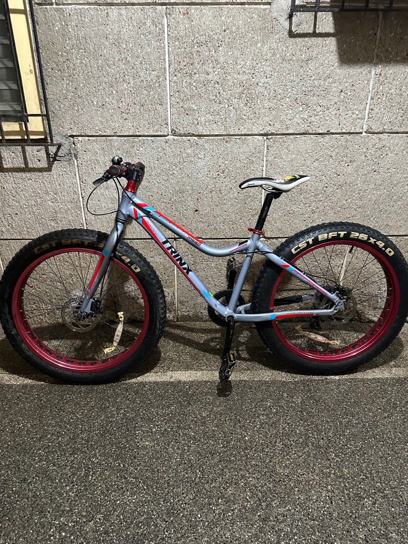 Trinx Fat Bike (Category: Bicycles) located in Quezon City. Submitted by michael.mendoza (Listing ID 1200781278, Image 2). Description: Trinx Fat Bike Size 26 Shimano Hydraulic Brakes Shimano Shifter Shimano Rear Derailer 1x8 Velo Saddle issue: fat kagaya ng may ari (wala) Rfs: Hindi na nagagamit sa dami ng bike.