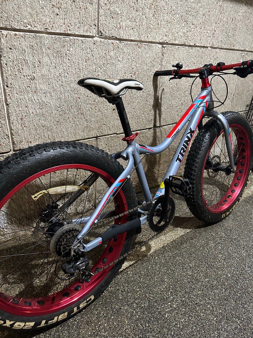 Trinx Fat Bike (Category: Bicycles) located in Quezon City. Submitted by michael.mendoza (Listing ID 1200781278, Image 3). Description: Trinx Fat Bike Size 26 Shimano Hydraulic Brakes Shimano Shifter Shimano Rear Derailer 1x8 Velo Saddle issue: fat kagaya ng may ari (wala) Rfs: Hindi na nagagamit sa dami ng bike.