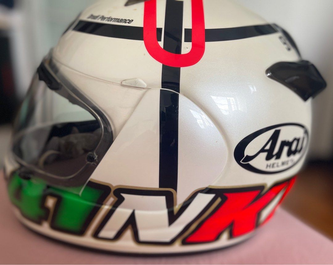 Arai Full face Helmet (Category: Motorcycle Apparel) located in Singapore. Submitted by kgsgp (Listing ID 1206399302, Image 2). Description: Name & pics says it all, it's a rare full face helmet. Made in Japan Size 61.62cm Free apprilia stickers Great condition, occasionally used..