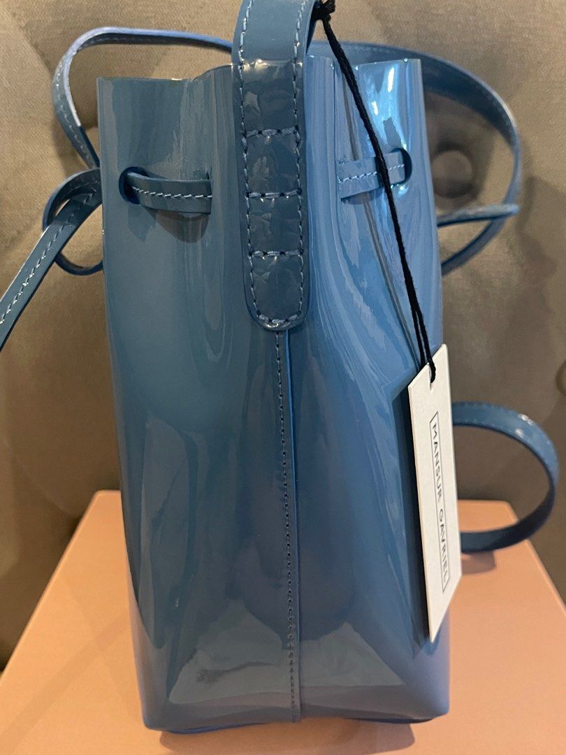 Authentic MANSUR GAVRIEL (Category: Luxury Bags & Wallets) located in Cainta. Submitted by closet83 (Listing ID 1206359966, Image 3). Description: 🔴PLEASE READ🔴 MAJOR DECLUTTERING •Authentic Mansur Gavriel Mini Mini bucket bag •Rare patent material blue color •Retails for 22-28k •Selling low at 15k 📍FIXED PRICE📍 •Comes complete (box, tags,) •6”W x 8”H x 4”Dia •Location: Cainta Rizal.