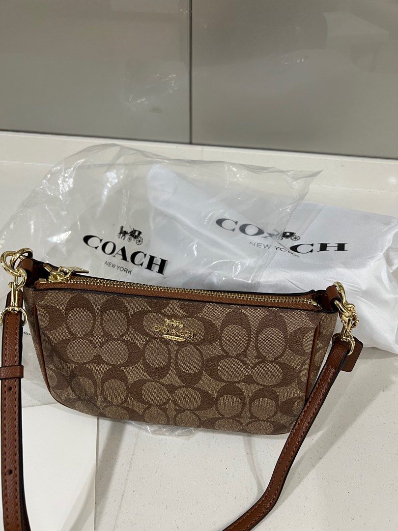 Coach nolita wristlet sales 22