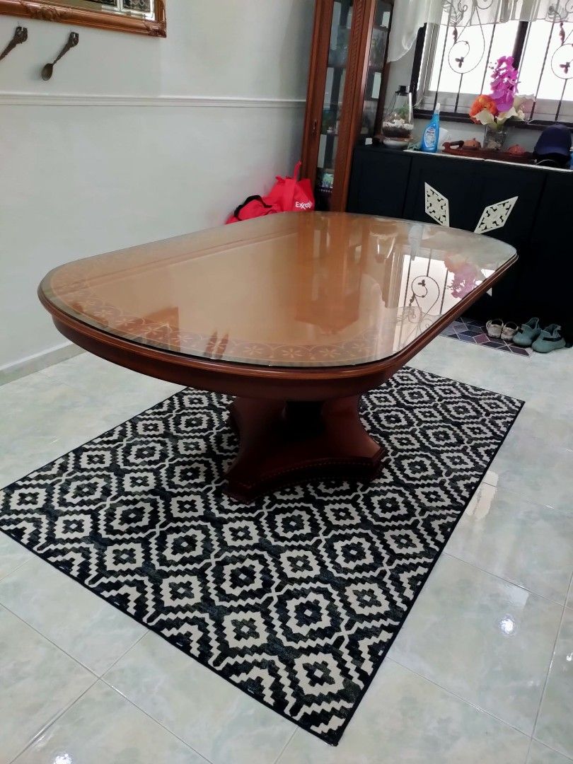 Dining Table (Category: Other Kitchenware & Tableware) located in Singapore. Submitted by zkrhrn (Listing ID 1206367693, Image 3). Description: heavy mahogany dining table with 6 chairs. bought at $3500, 6 years ago. still strong and sturdy...clearing up place as im gonna renovate the house.