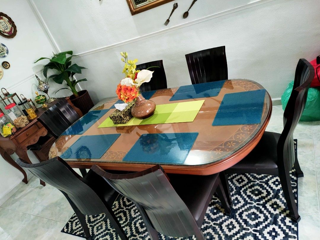 Dining Table (Category: Other Kitchenware & Tableware) located in Singapore. Submitted by zkrhrn (Listing ID 1206367693, Image 2). Description: heavy mahogany dining table with 6 chairs. bought at $3500, 6 years ago. still strong and sturdy...clearing up place as im gonna renovate the house.