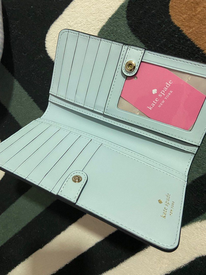 Kate Spade Bailey Large Slim Bifold Wallet in Frosty Sky, Women's Fashion,  Bags & Wallets, Clutches on Carousell