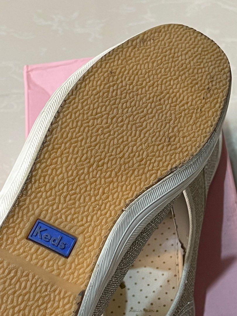 Keds x Kate Spade Sneakers (Category: Sneakers) located in Paranaque City. Submitted by joyzann (Listing ID 1206382094, Image 3). Description: Keds x Kate Spade Sneakers Light Gold US Size 9 With unused shoelace/ribbon as shown in pic Retails for 4995 in the Laz Official Store A bit bigger for my size Super pretty in actual Slightly nego .
